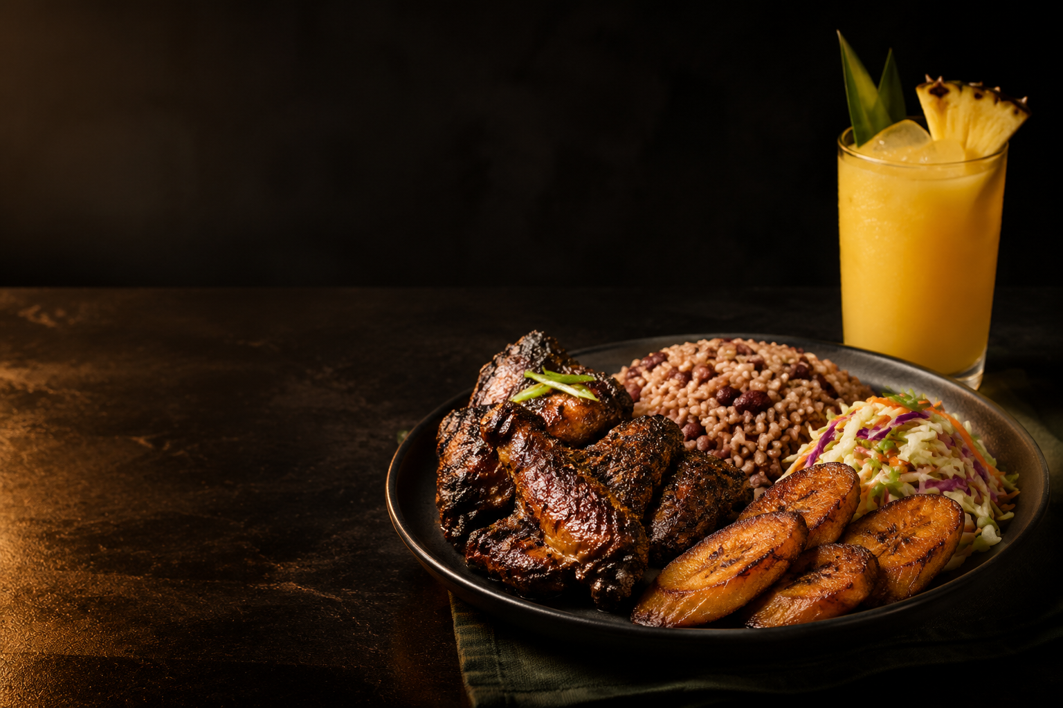 Caribbean-inspired jerk chicken with rice and peas, plantain, slaw and fresh tropical juice
